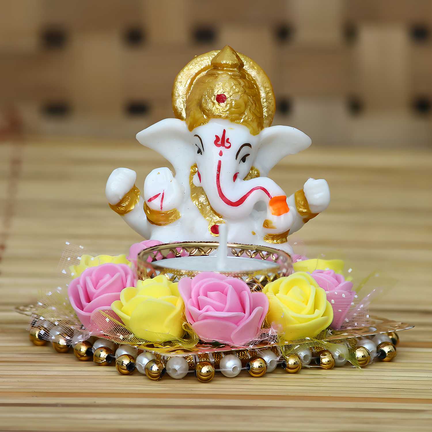 Lord Ganesha Idol on Decorative Plate with Tea Light Holder